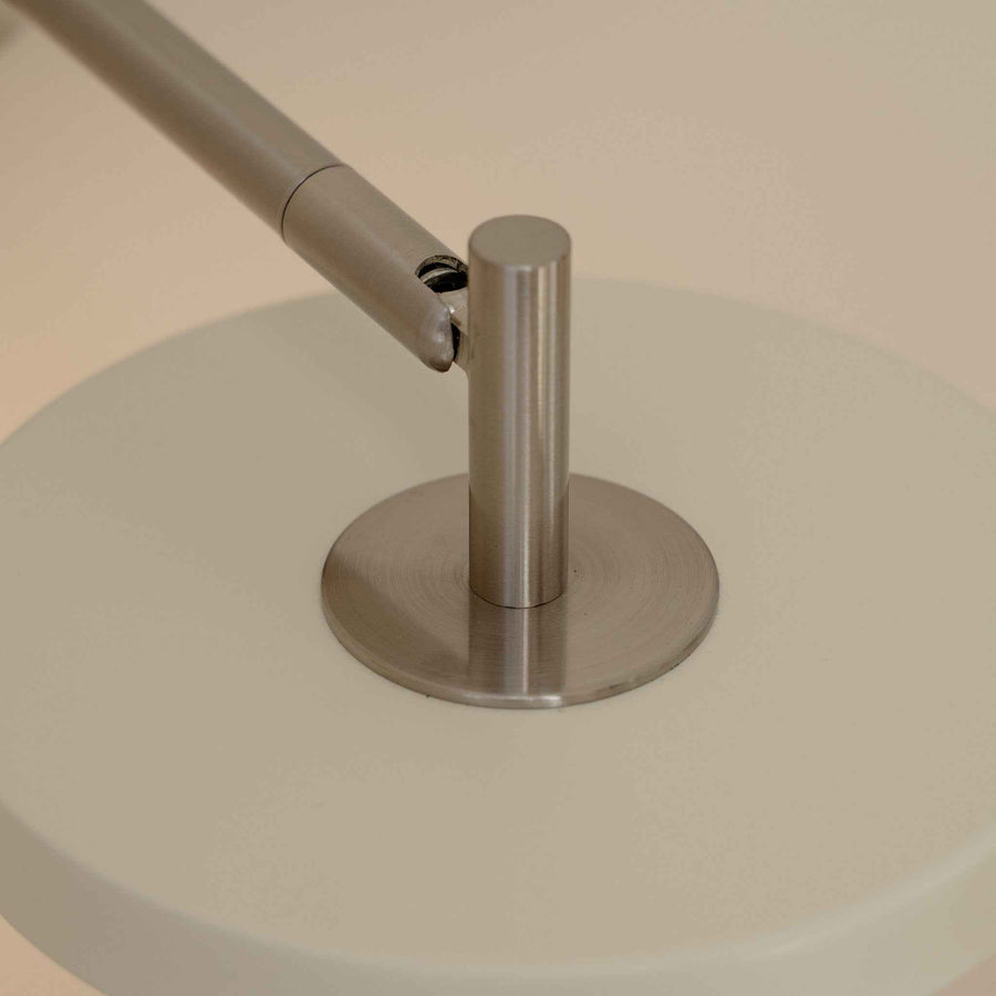 UMAGE_lifestyle_Asteria_wall lamp_short_hardwired_nuance mist_steel_(1).jpeg